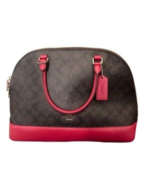 Coach Brown Signature Dome Satchel with Pink Trim.